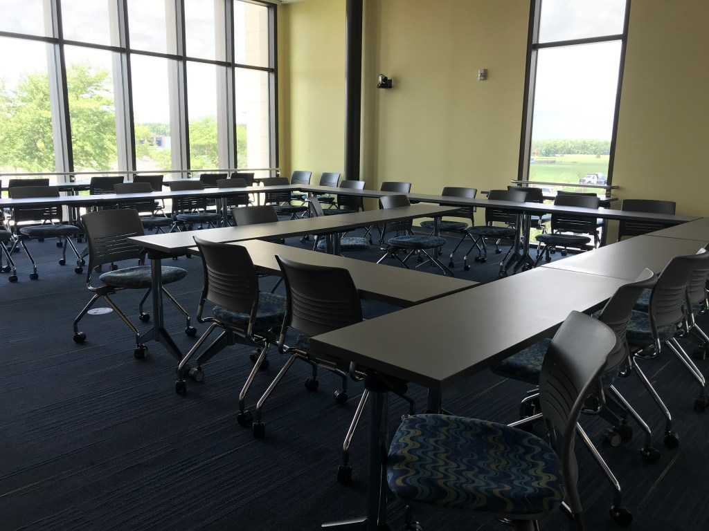 Room with tables and chairs